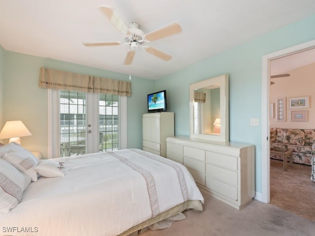 carpeted bedroom featuring access to exterior and ceiling fan