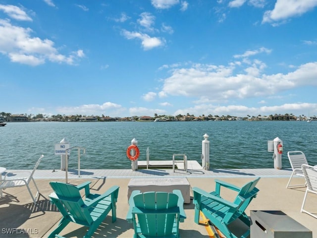 view of dock with a water view