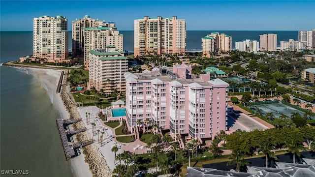 aerial view with a view of the beach and a water view