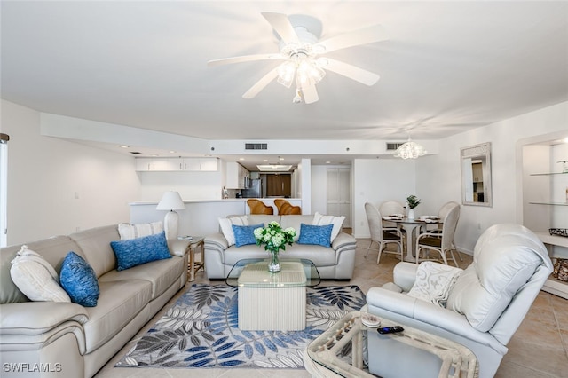 tiled living room featuring ceiling fan