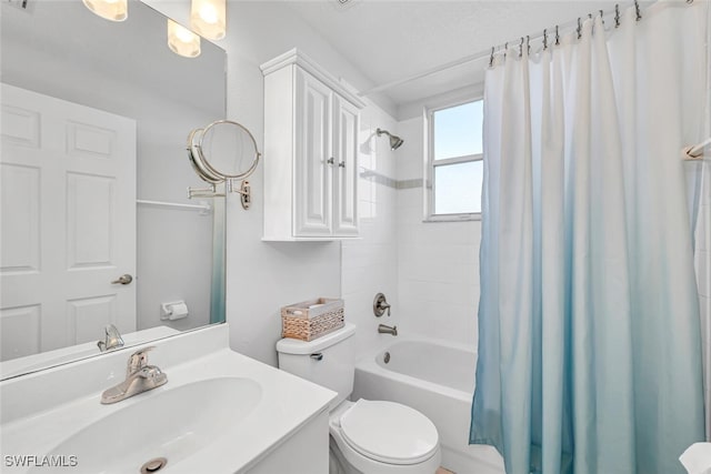 full bathroom featuring shower / bathtub combination with curtain, vanity, and toilet