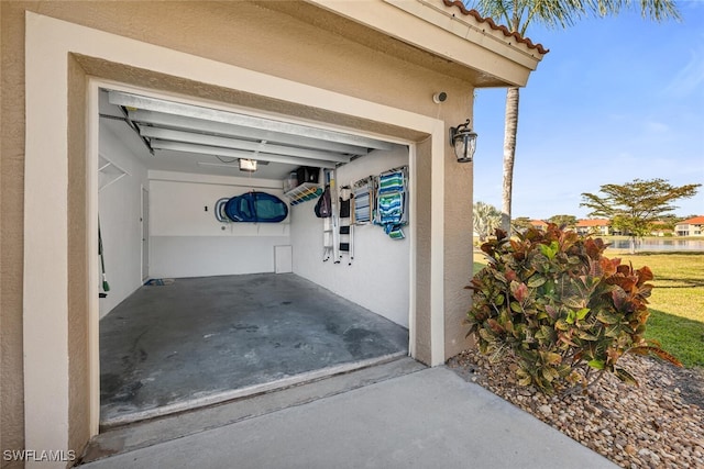 garage featuring a garage door opener