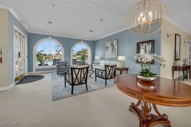 dining space featuring ornamental molding and an inviting chandelier