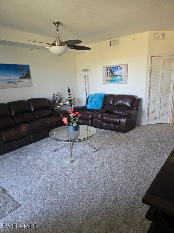 living room featuring ceiling fan