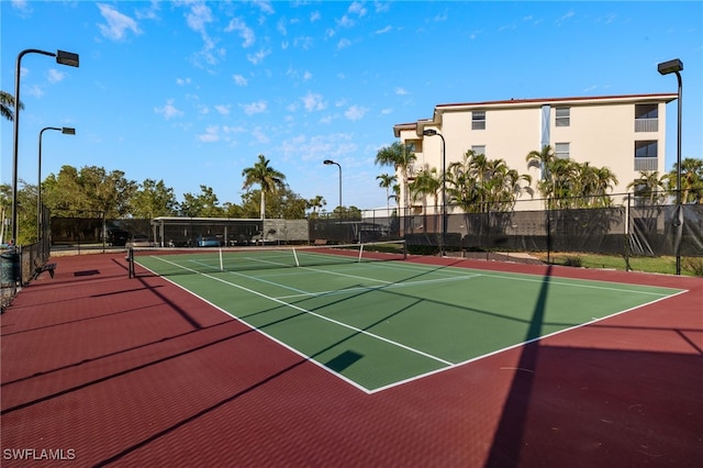 4015 Palm Tree Blvd Unit 304, Cape Coral, FL 33904 - view of tennis court featuring community basketball court