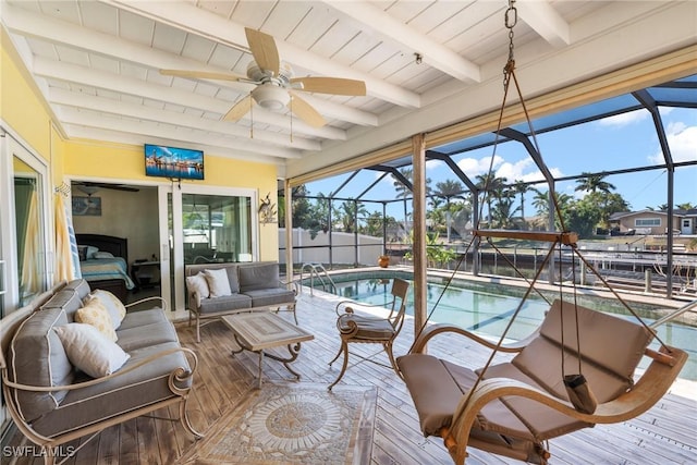 view of pool featuring ceiling fan