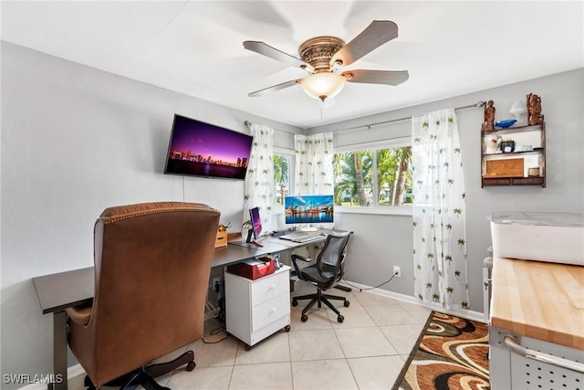 tiled home office with ceiling fan