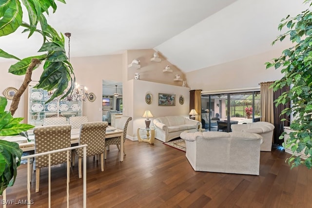 living room with dark hardwood / wood-style flooring and high vaulted ceiling