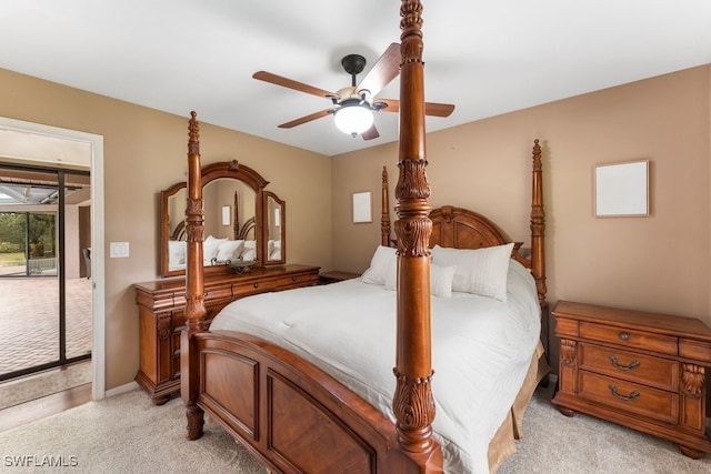 carpeted bedroom featuring ceiling fan and access to outside