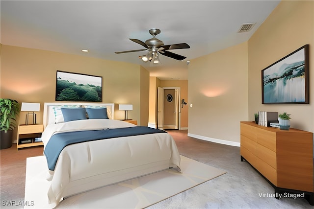 carpeted bedroom featuring ceiling fan