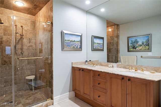 bathroom featuring vanity and an enclosed shower