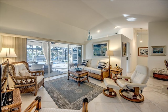 living room featuring lofted ceiling and light tile patterned floors