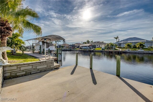 dock area with a water view