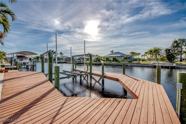 view of dock with a water view