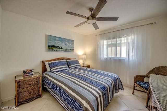 bedroom featuring light tile patterned floors and ceiling fan