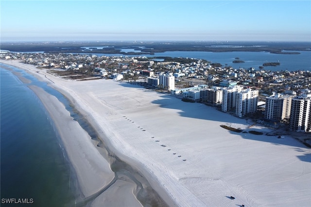 aerial view with a view of the beach and a water view