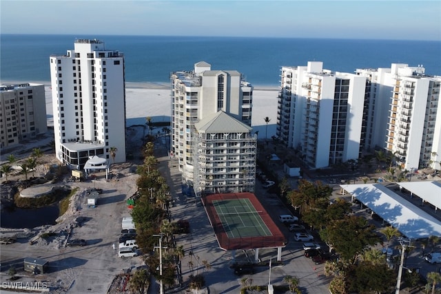 aerial view featuring a water view and a view of the beach