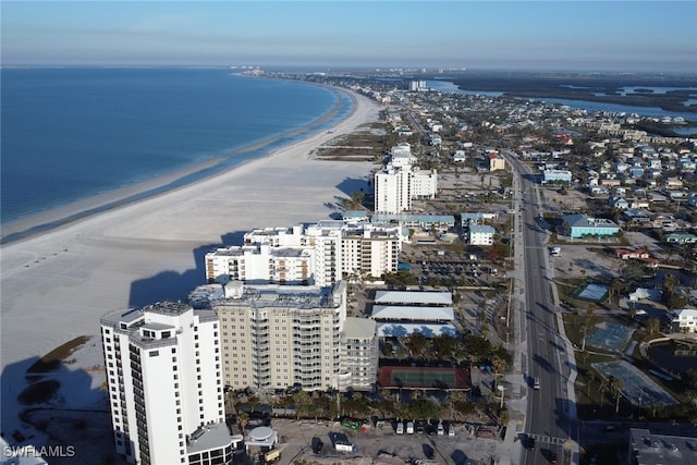 bird's eye view with a water view and a view of the beach