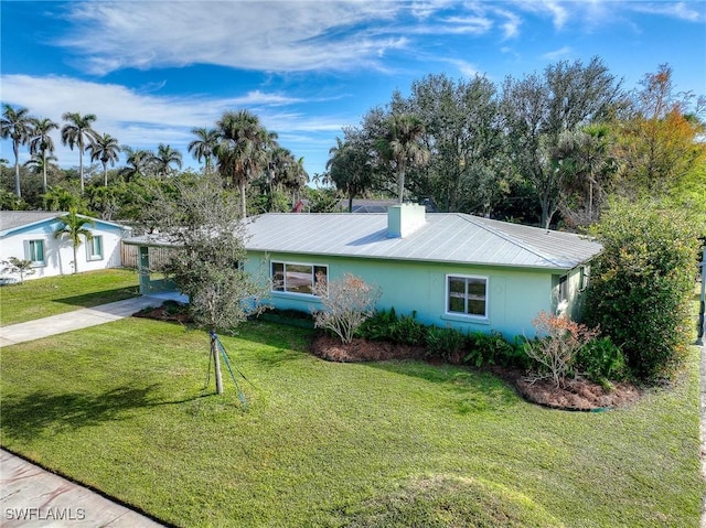 single story home with a front yard