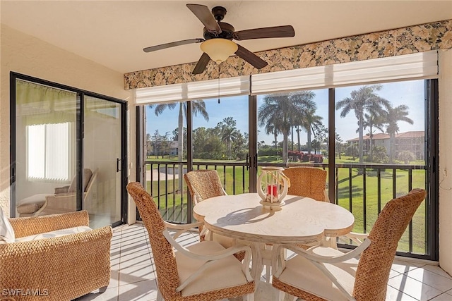 sunroom / solarium with ceiling fan