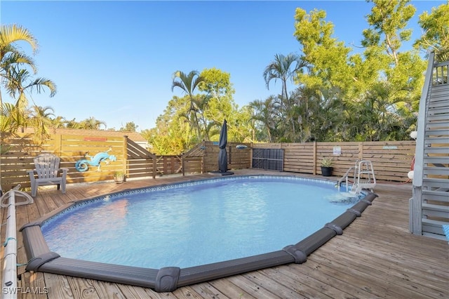 view of pool featuring a deck