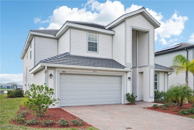 front of property featuring a garage