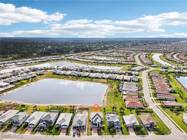 drone / aerial view featuring a water view