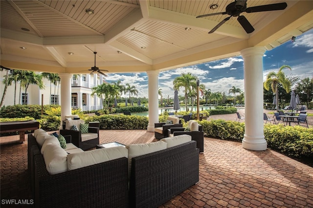 view of patio featuring an outdoor living space, a gazebo, and ceiling fan