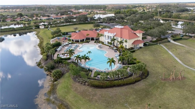 drone / aerial view with a water view