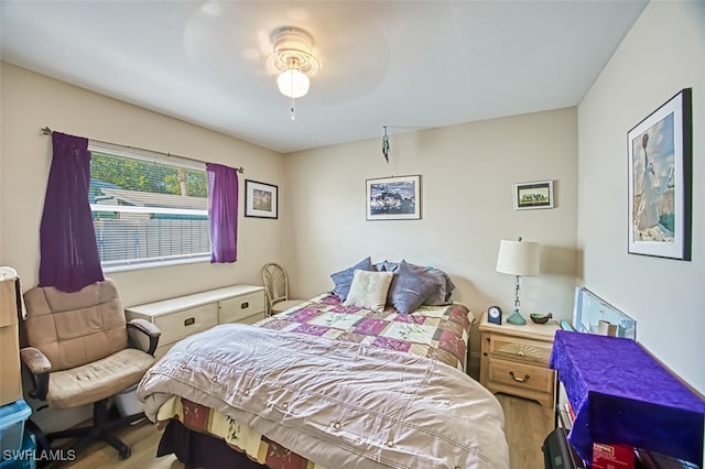 bedroom featuring hardwood / wood-style flooring