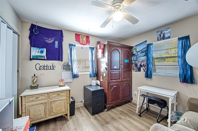 office area featuring ceiling fan and light wood-type flooring