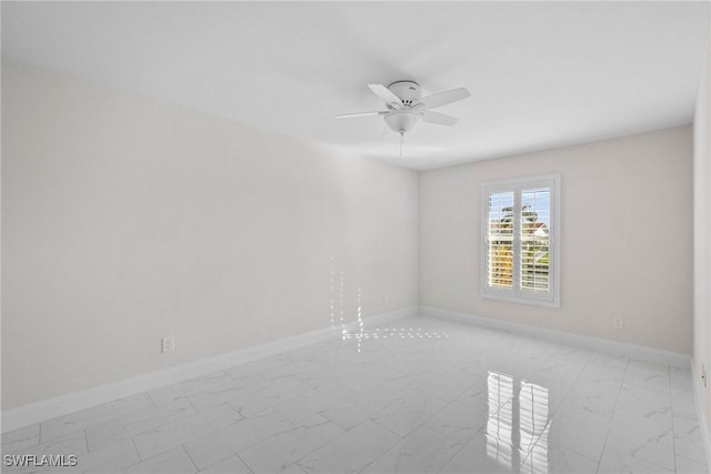 empty room featuring ceiling fan