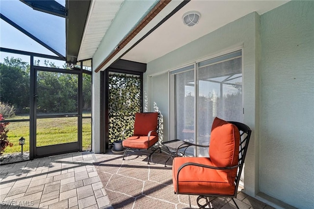 sunroom / solarium with beamed ceiling