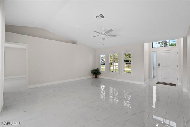 unfurnished living room featuring vaulted ceiling and ceiling fan