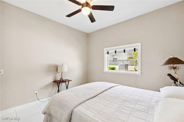 bedroom with light tile patterned floors and a ceiling fan