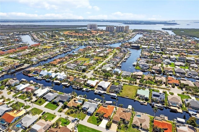 aerial view featuring a water view and a residential view