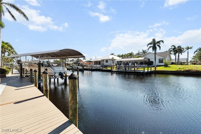 view of dock featuring a water view and boat lift