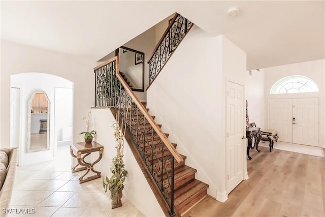 foyer entrance with light hardwood / wood-style floors