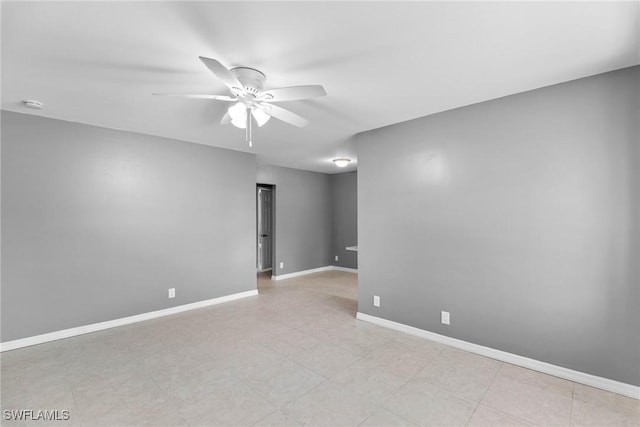 spare room with ceiling fan