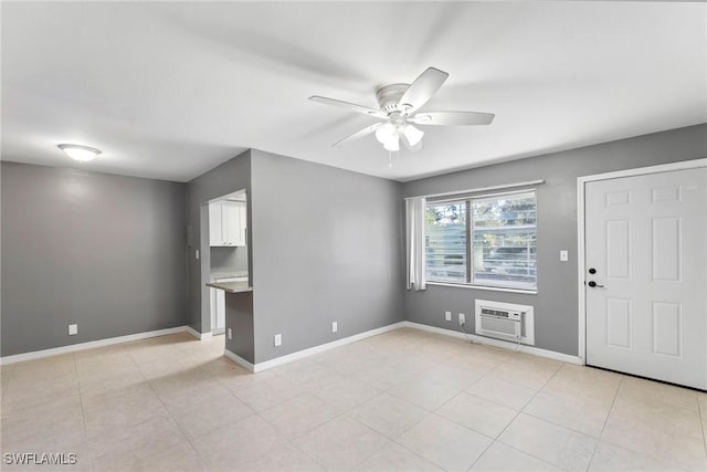 interior space with an AC wall unit and ceiling fan