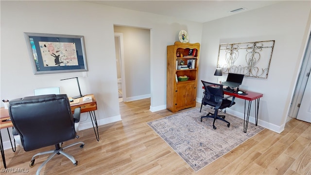 office featuring light hardwood / wood-style floors