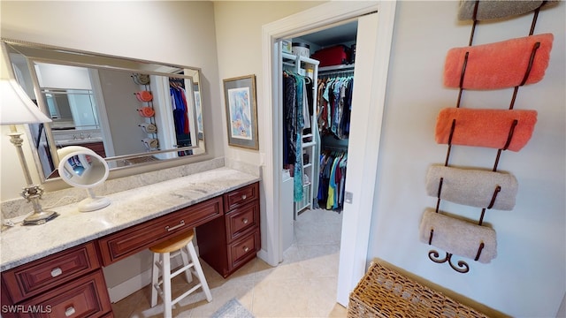 bathroom with vanity and tile patterned flooring