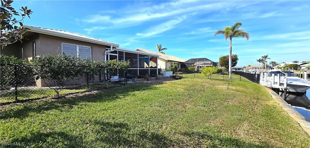 view of yard featuring a sunroom