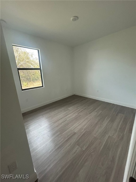 empty room featuring hardwood / wood-style floors