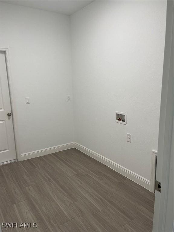 empty room with dark hardwood / wood-style floors