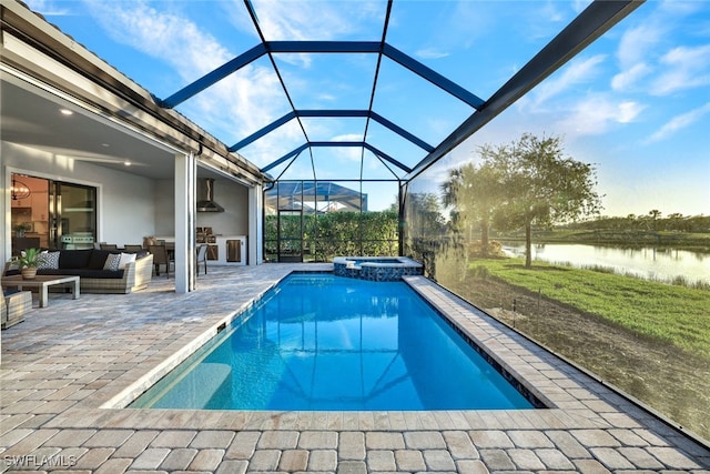 view of swimming pool with a patio, an outdoor hangout area, a water view, an in ground hot tub, and a lanai