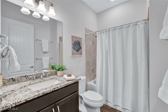 full bathroom with wood-type flooring, vanity, toilet, and shower / bathtub combination with curtain