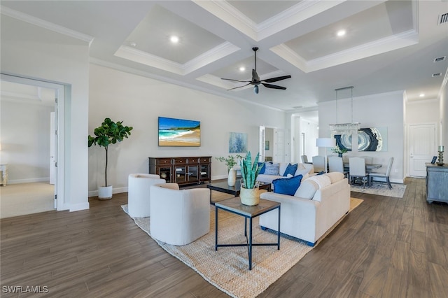 living room featuring coffered ceiling, dark wood-type flooring, crown molding, and ceiling fan