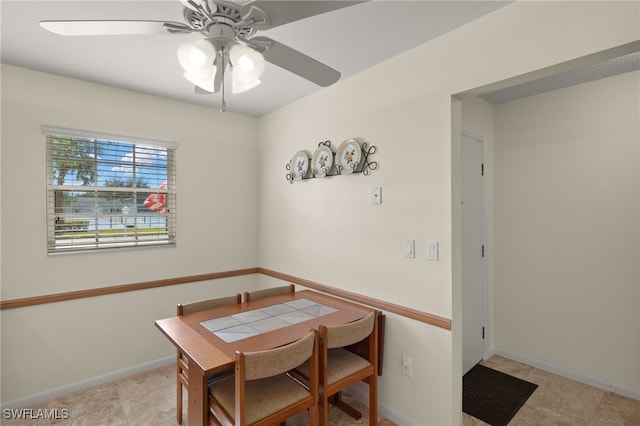 dining space with ceiling fan