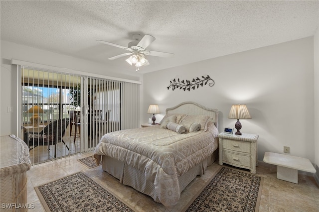 bedroom featuring light tile patterned flooring, ceiling fan, access to exterior, and a textured ceiling